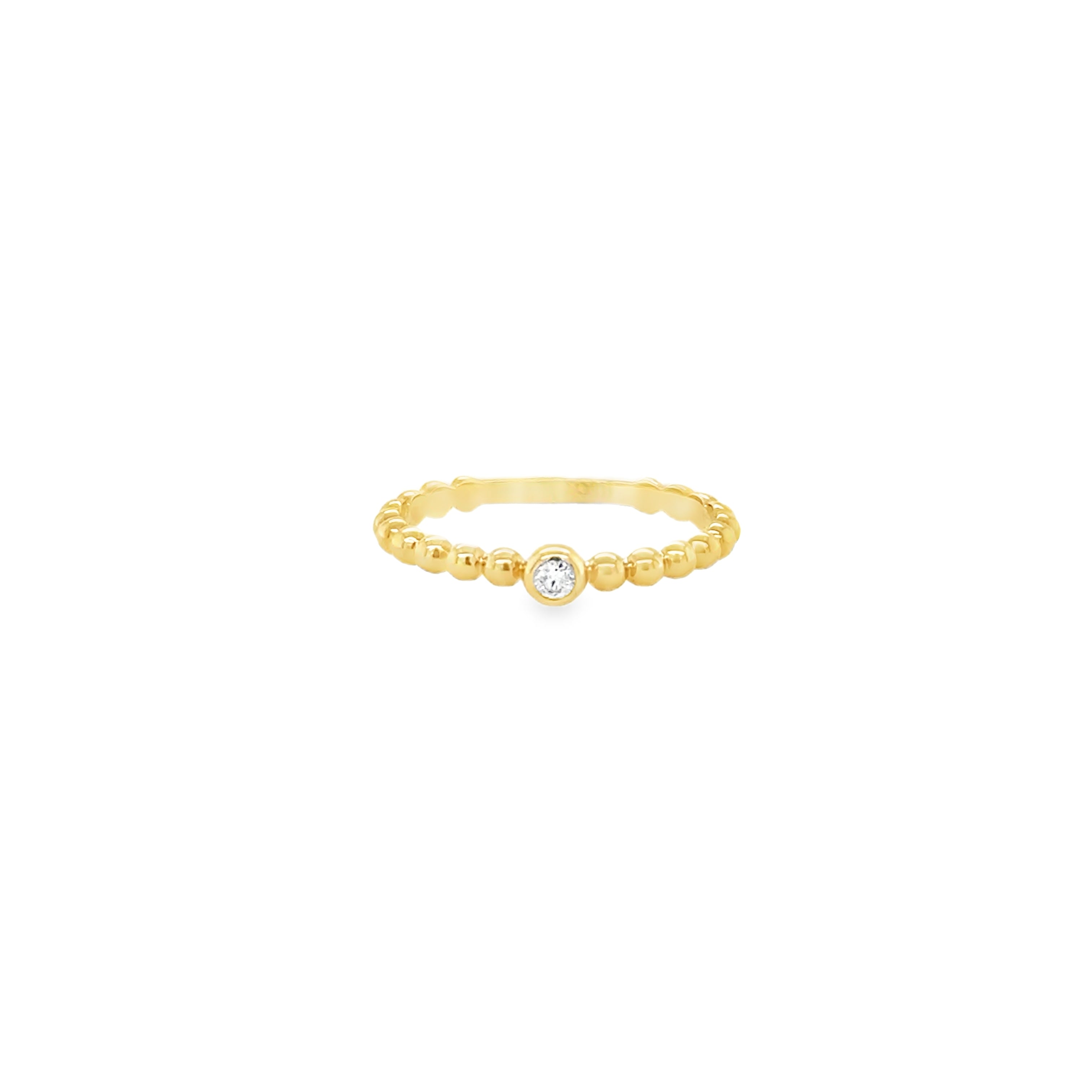 Gold bead ring with a single diamond in the center on a white background.