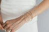 Close-up of Jessica Jewellery's Petite Pearl by the Yard Bracelet, highlighting the fine details.