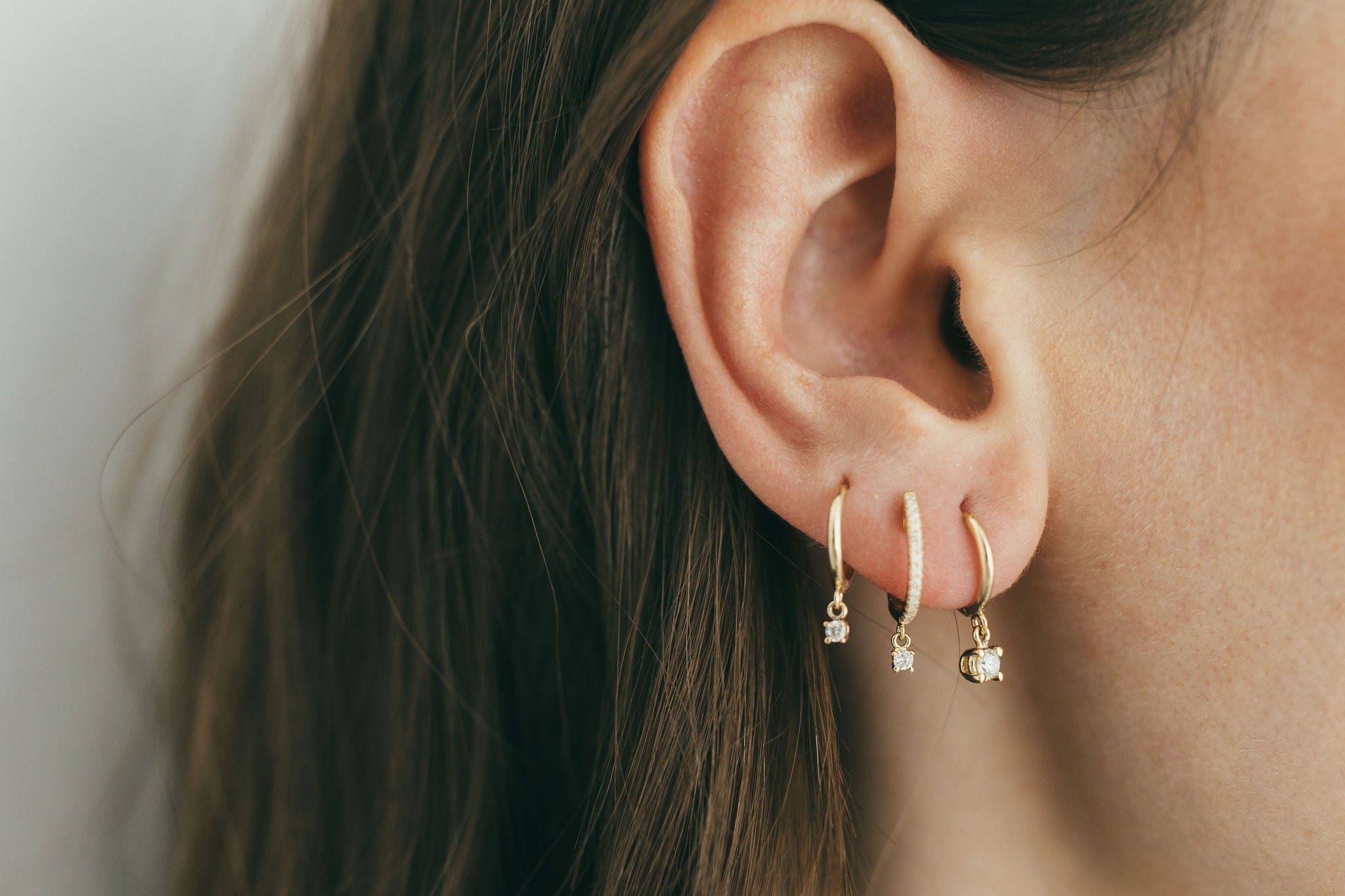 14K Gold Dangling Diamond Huggie Earrings