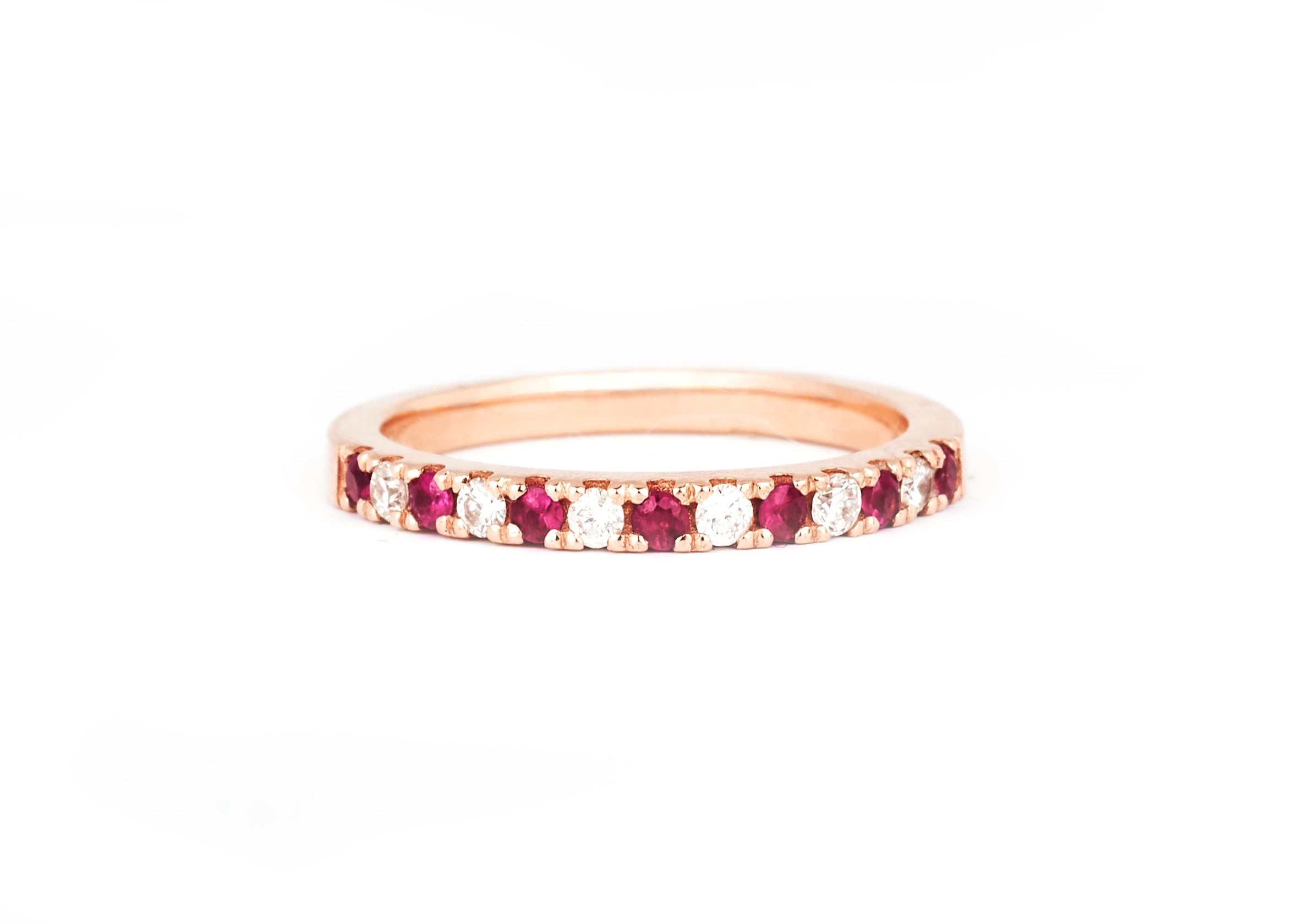 A 2mm alternating diamond and birthstone ring against a white background.