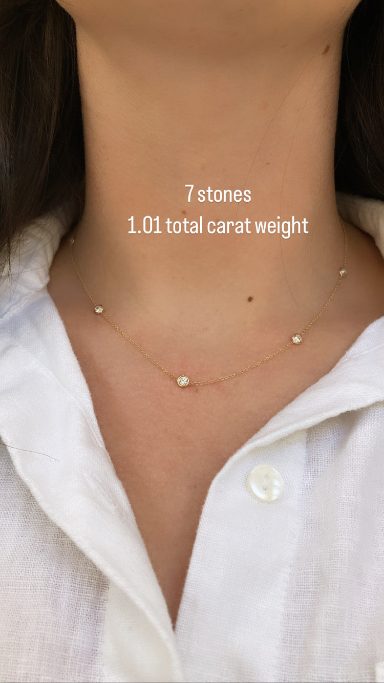 Jessica Jewellery's diamond bezel station necklace draped elegantly.