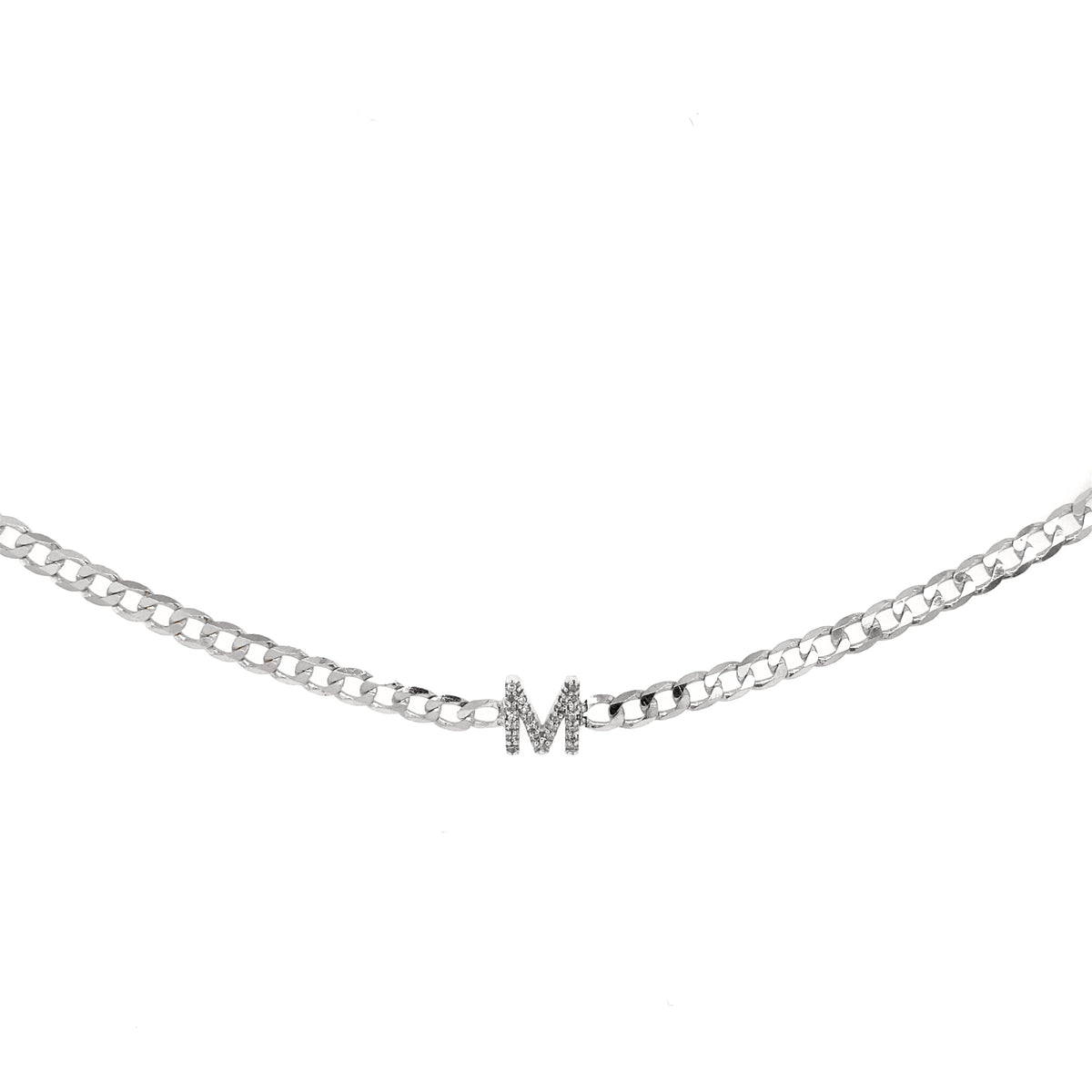 White gold curb chain bracelet with a diamond letter attached in the middle.