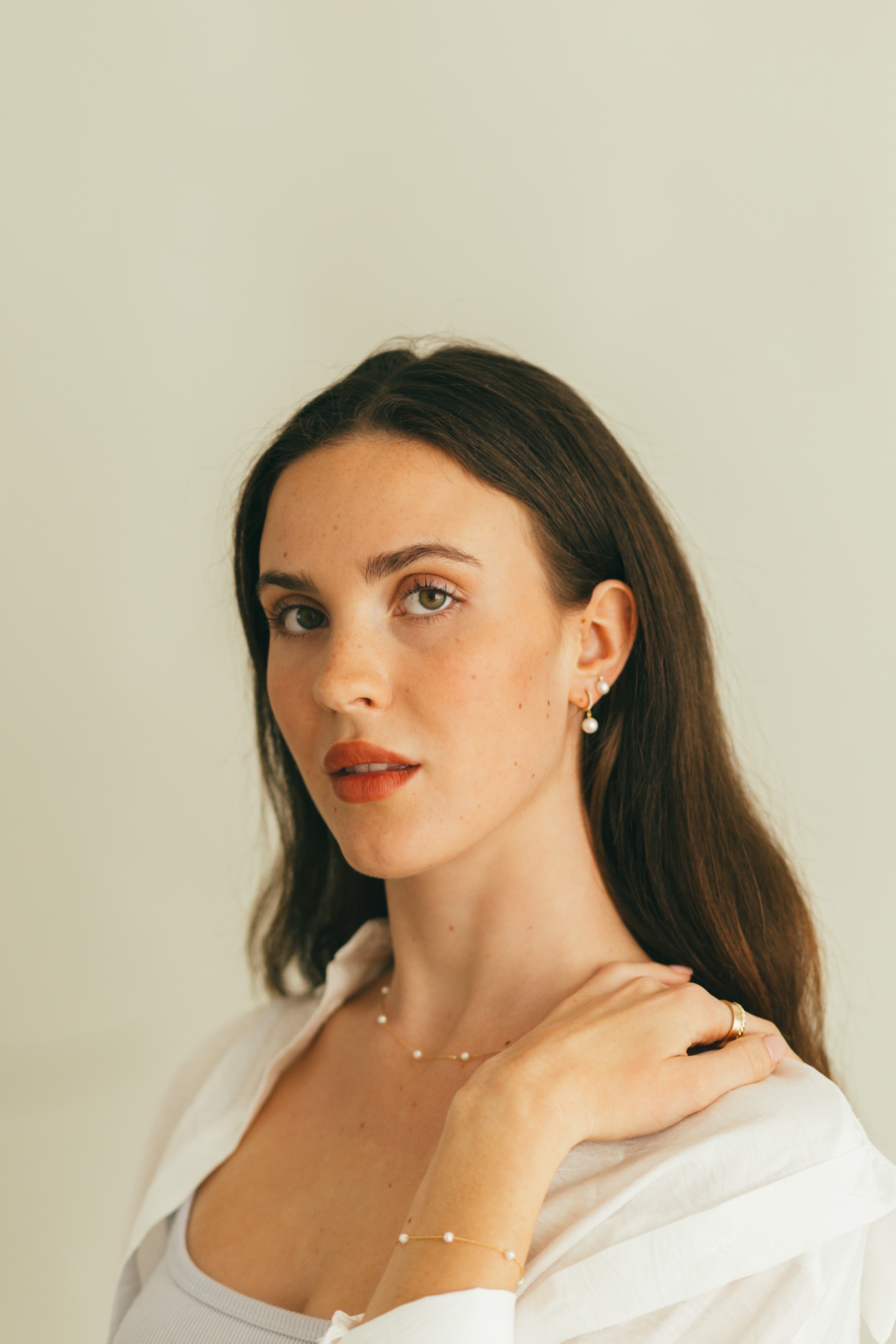 Diamond Huggie Earrings with a Pearl Drop