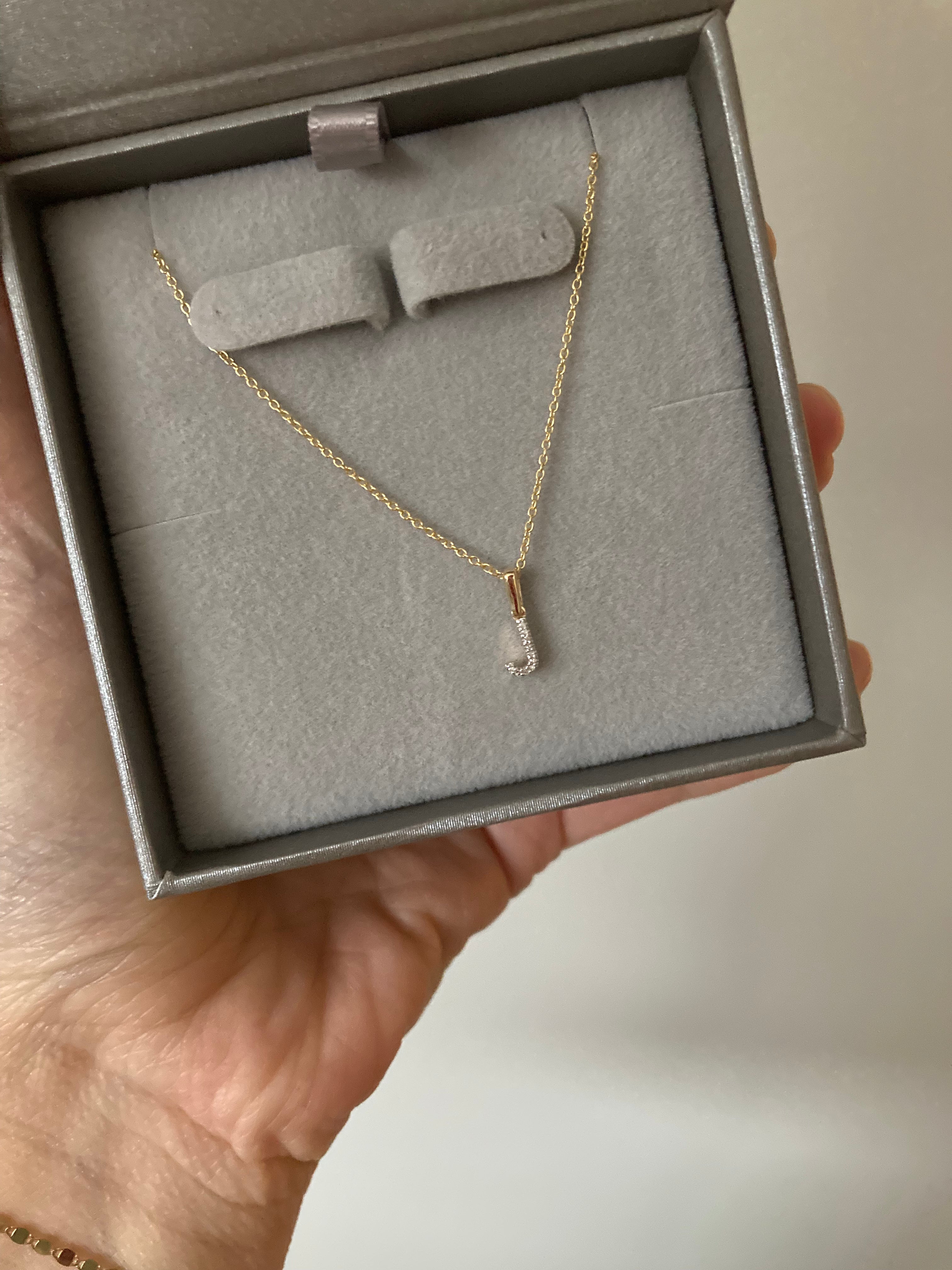 Stylish diamond initial charm from Jessica Jewellery, available in various initials.