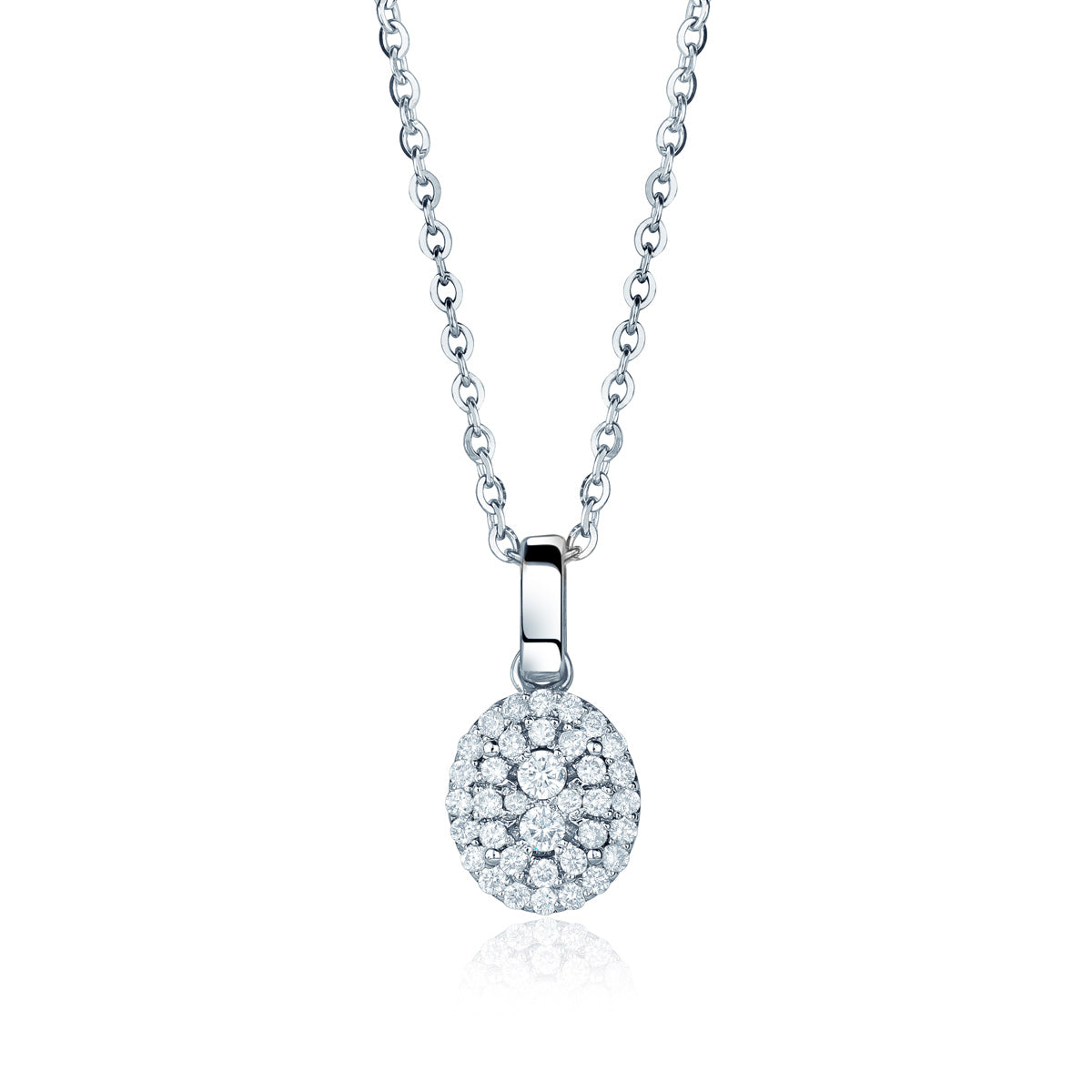 close up of oval diamond cluster pendant on a chain on a white background