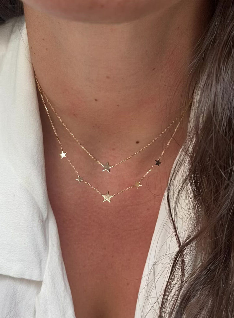Dainty star charm on a delicate gold chain by Jessica Jewellery