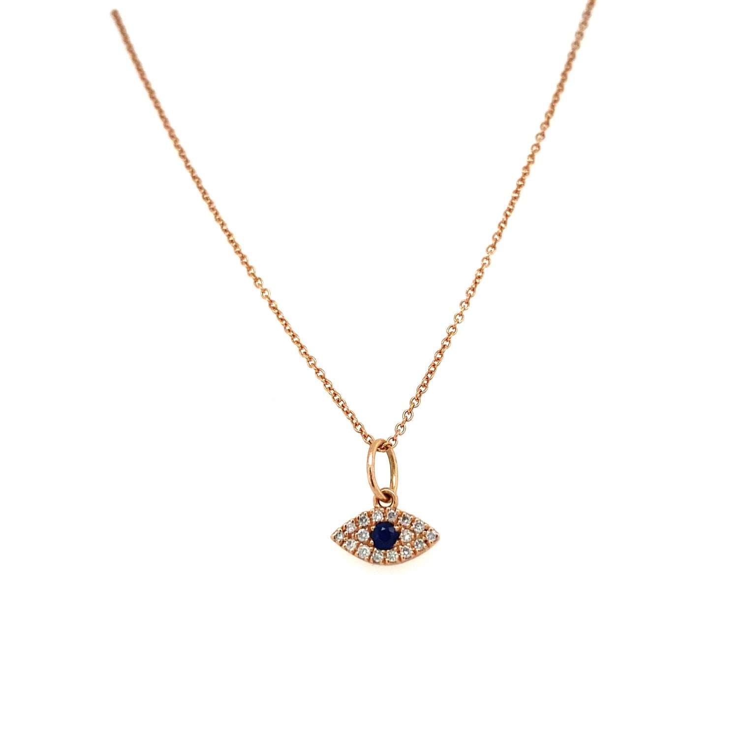 A gold necklace featuring a charm with the shape of an evil eye, composed of a large blue sapphire surrounded by small diamonds.