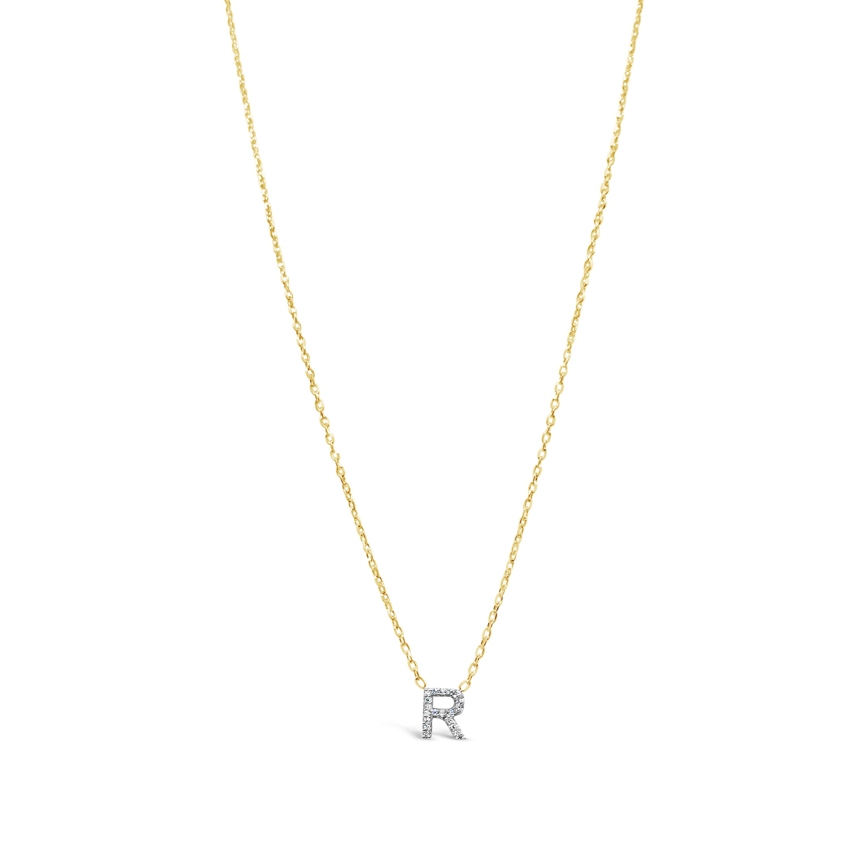 Single Diamond Initial Necklace - Close-up view of delicate pendant with a single sparkling diamond, customizable with initials. Handcrafted by Jessica Jewellery.
