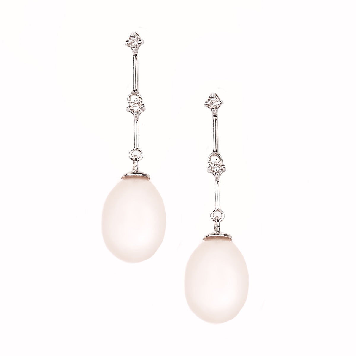 Pearl drop and diamond earrings by Jessica Jewellery.