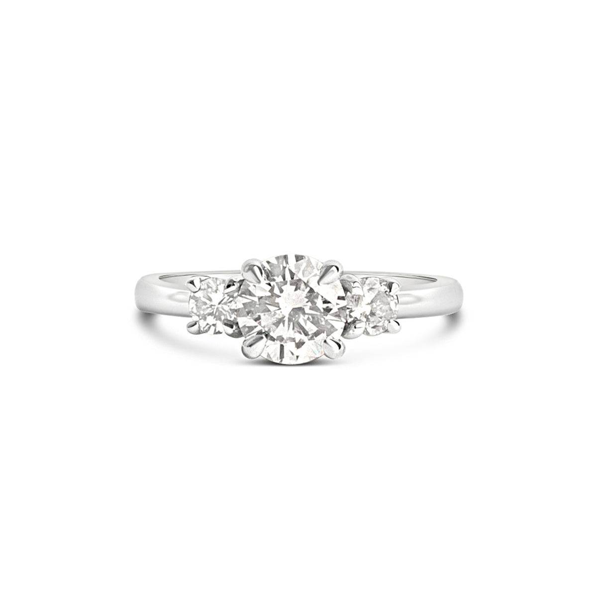A three stone engagement ring with a central diamond surrounded by two smaller side diamonds, set in a white gold band.