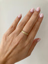 Styling of Jessica Jewellery's small croissant ring.