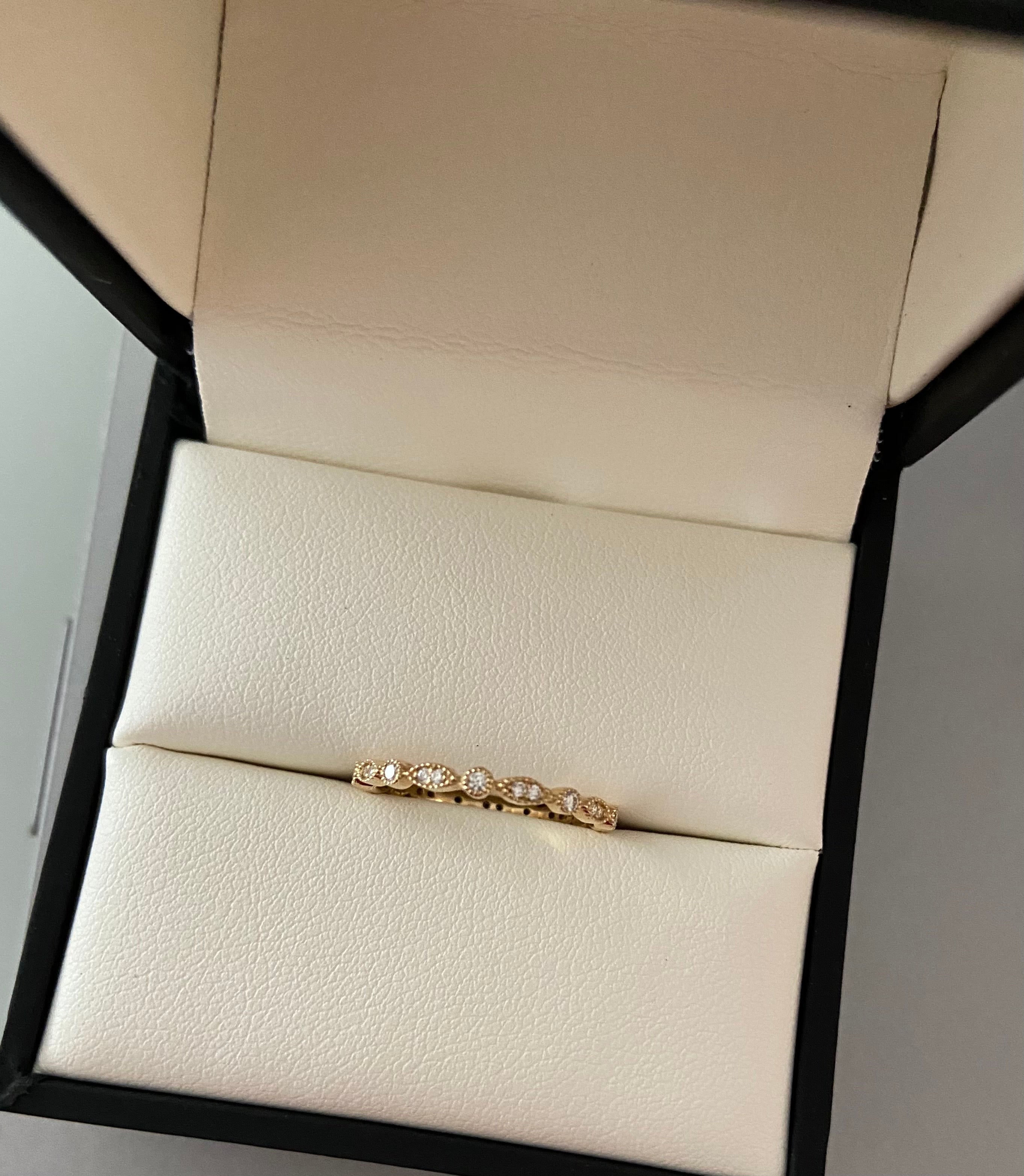 Round and Marquise Shaped Diamond Ring