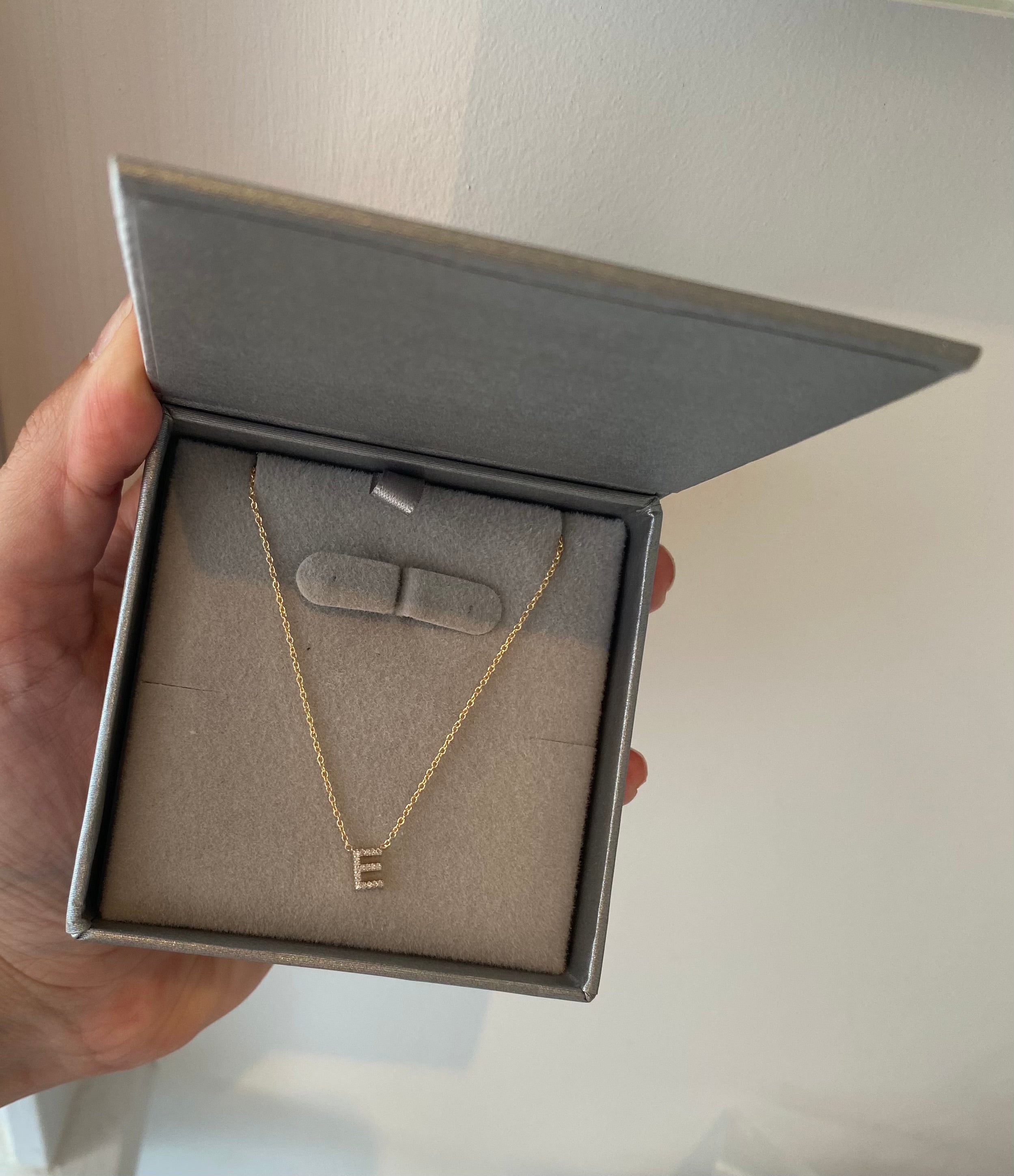 Detailed view of the diamond pendant on Jessica Jewellery's Initial Necklace - Exquisite craftsmanship.