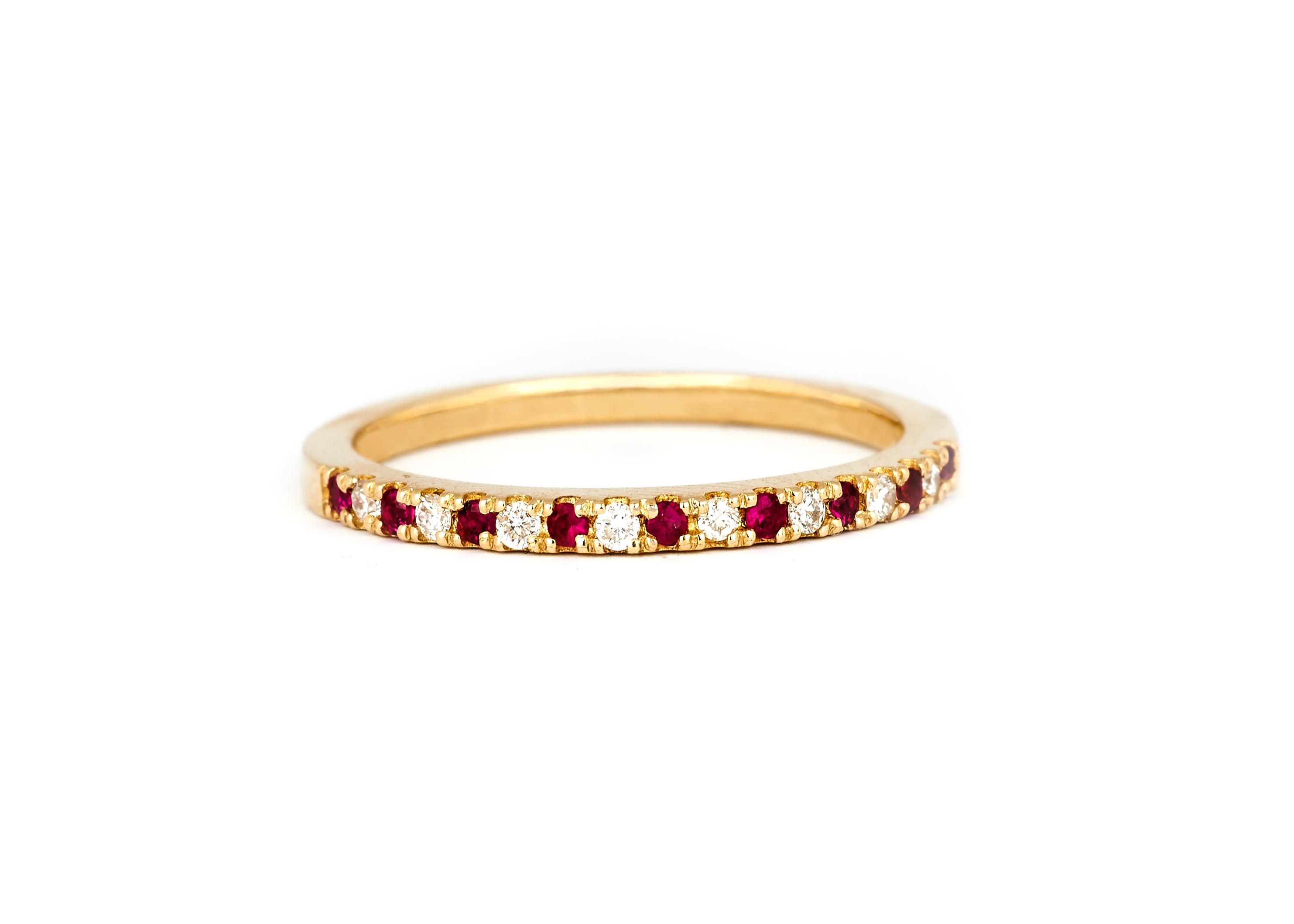 A 1.5mm alternating diamond and birthstone ring against a white background.