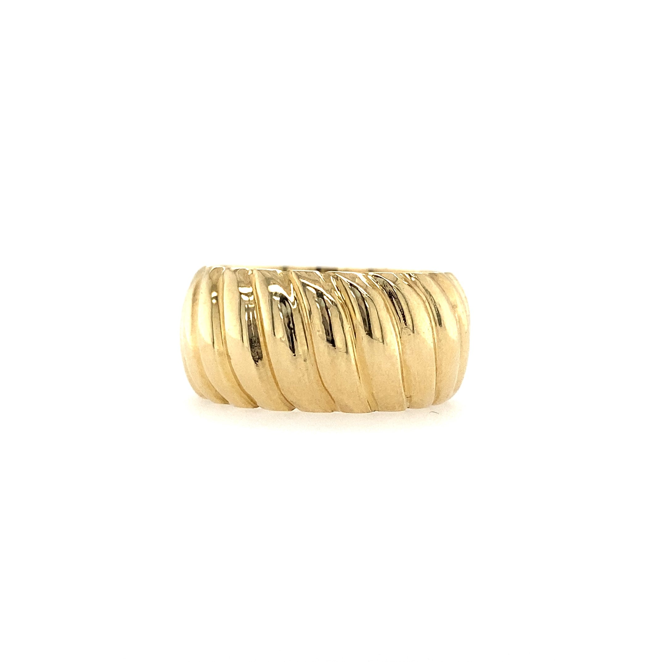 A yellow gold chunky wide croissant ring against a white background.