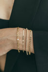 Detail view of the Flat Mirror Chain Bracelet highlighting its polished surface.