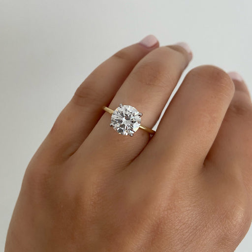 Handcrafted custom engagement ring with intricate diamond setting.