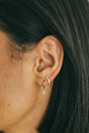 Dangling Emerald Diamond Bezel Huggie Earrings