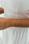 Timeless Flat Mirror Chain Bracelet, a staple accessory in gold.