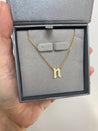 Large Gothic Initial Curb NecklaceJessica Jewellery Gothic Initial Necklace displayed in box.