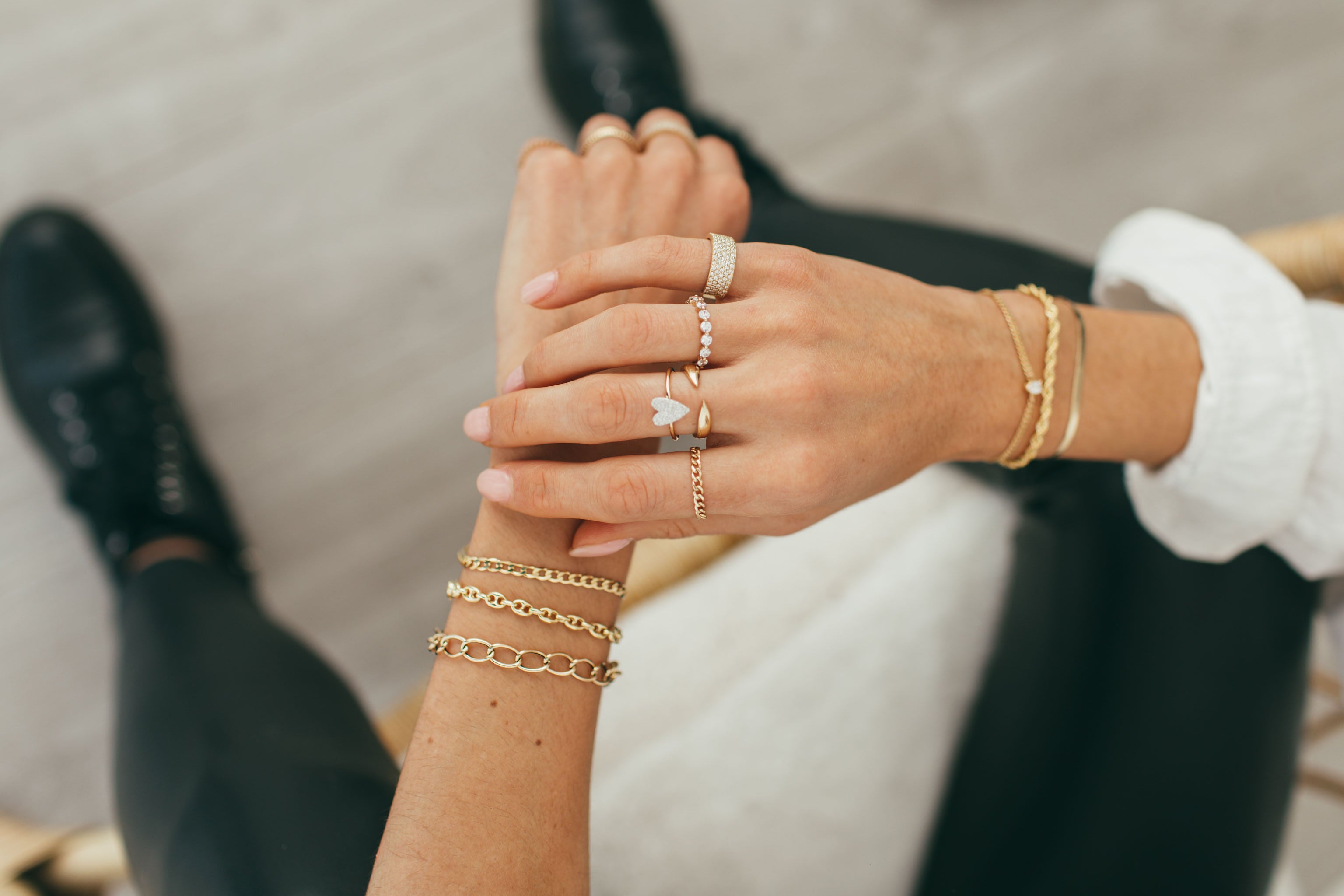 Stack of rings and bracelets on model