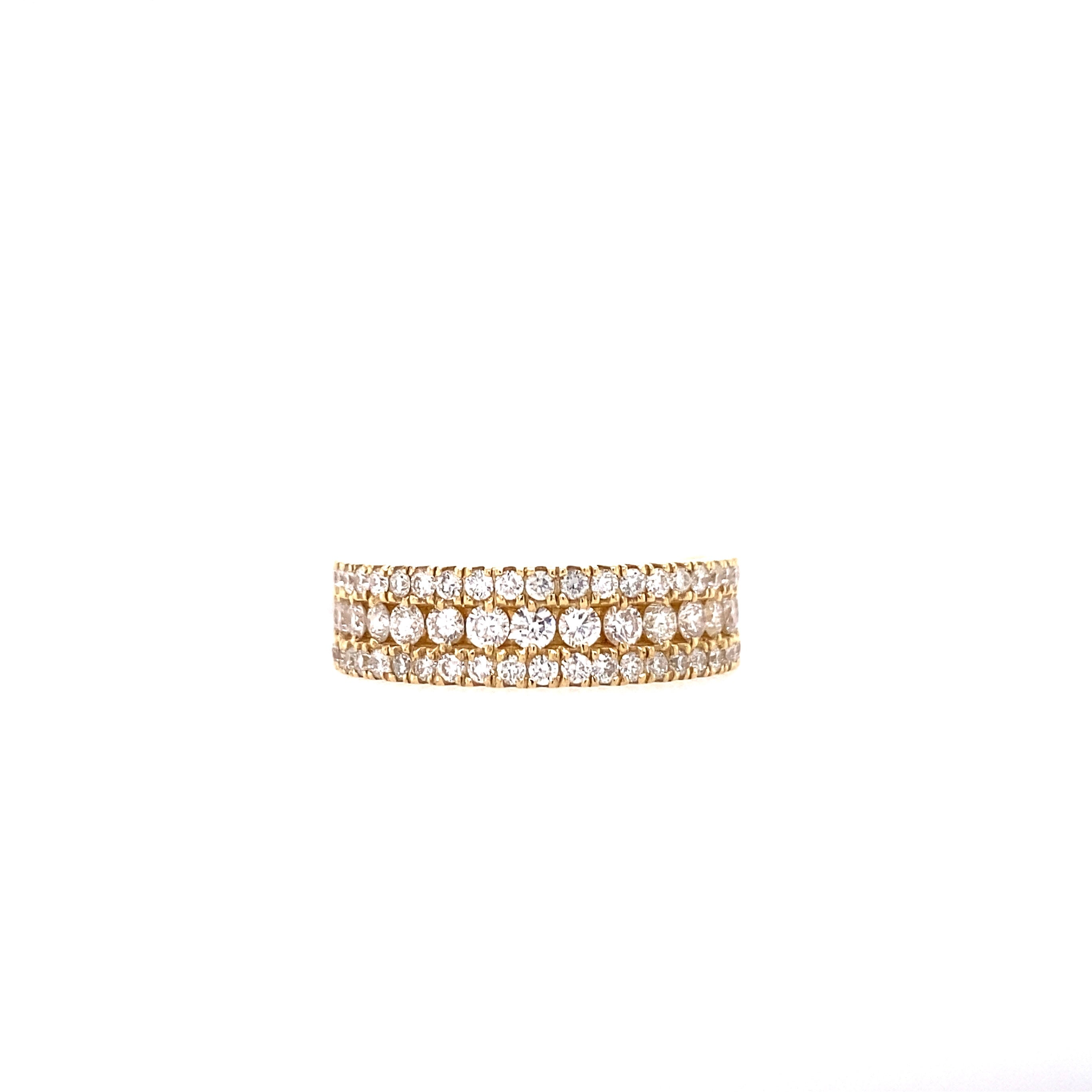 A large triple row pave ring with diamonds set in a yellow gold band, total weight of diamonds is 1.00 carats.