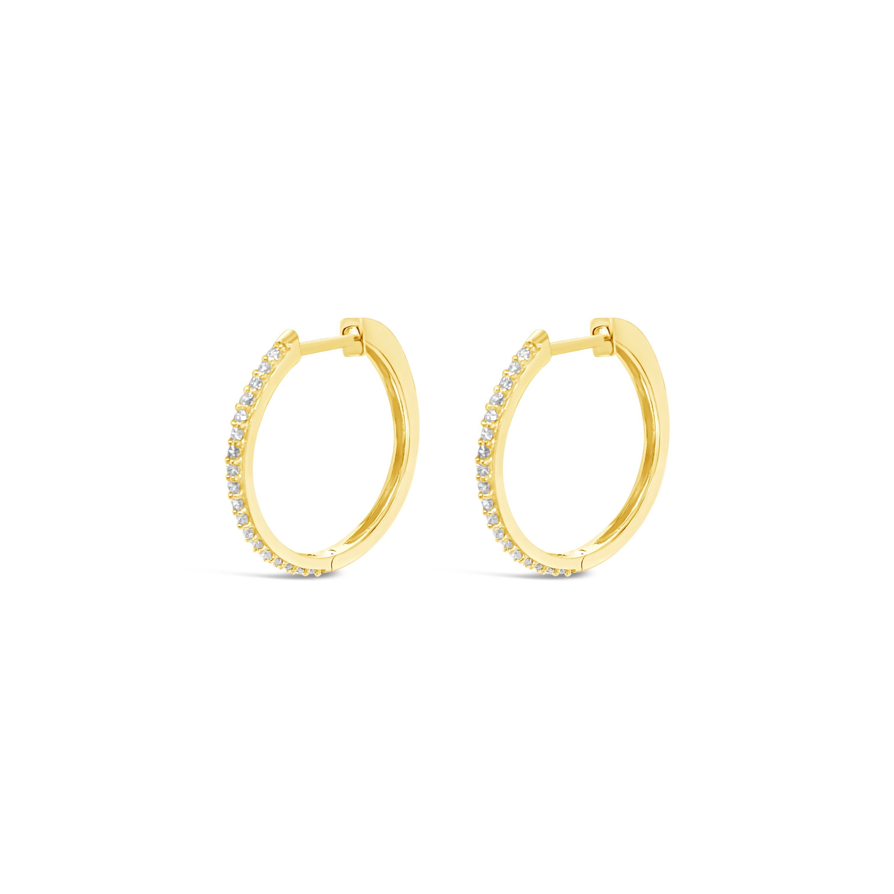 Close-up view of small diamond hoop earrings in 14 karat rose gold, highlighting the brilliant cut and clarity of the diamonds.