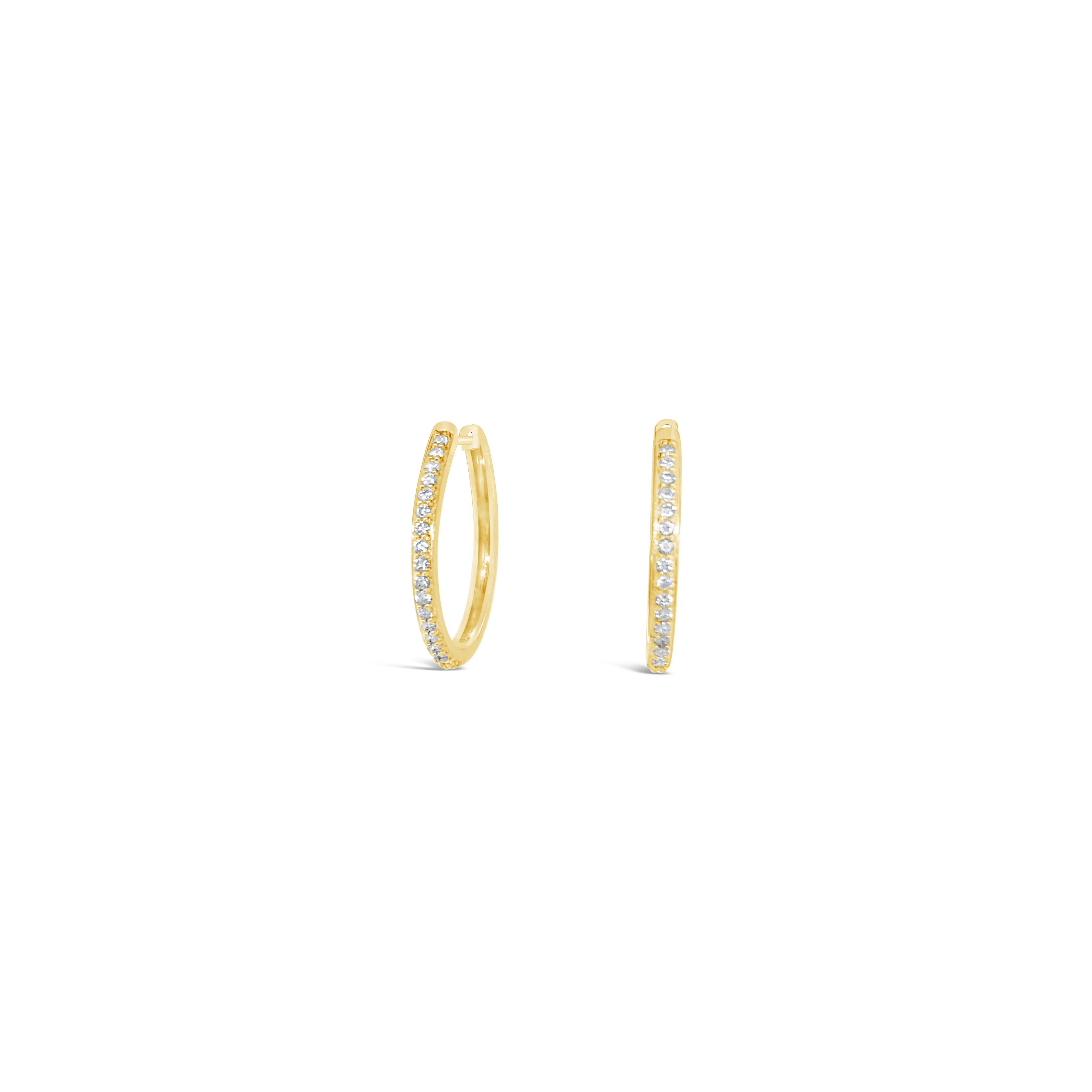 Elegant 14 karat yellow gold diamond hoop earrings, showcasing fine craftsmanship and brilliant sparkle.