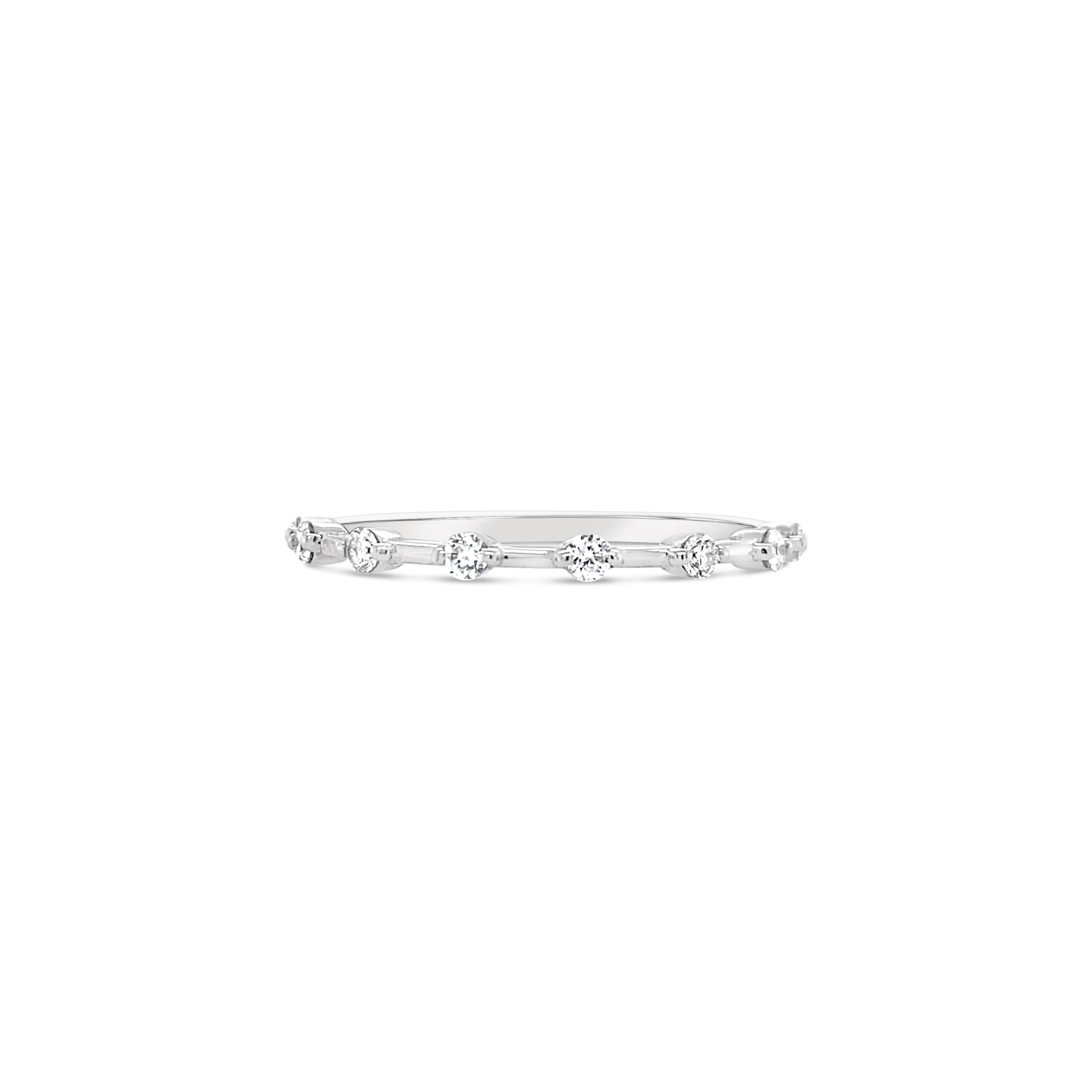 A 14K white gold spaced diamond ring featuring 8 diamond stones on a white background.