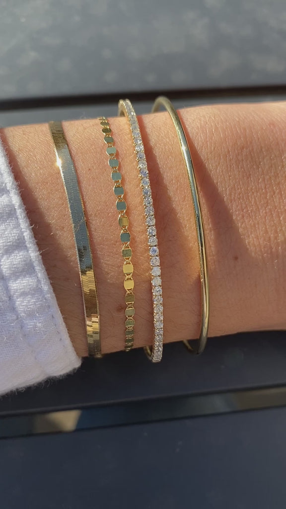 Versatile gold bracelet, ideal for stacking with other bracelets.