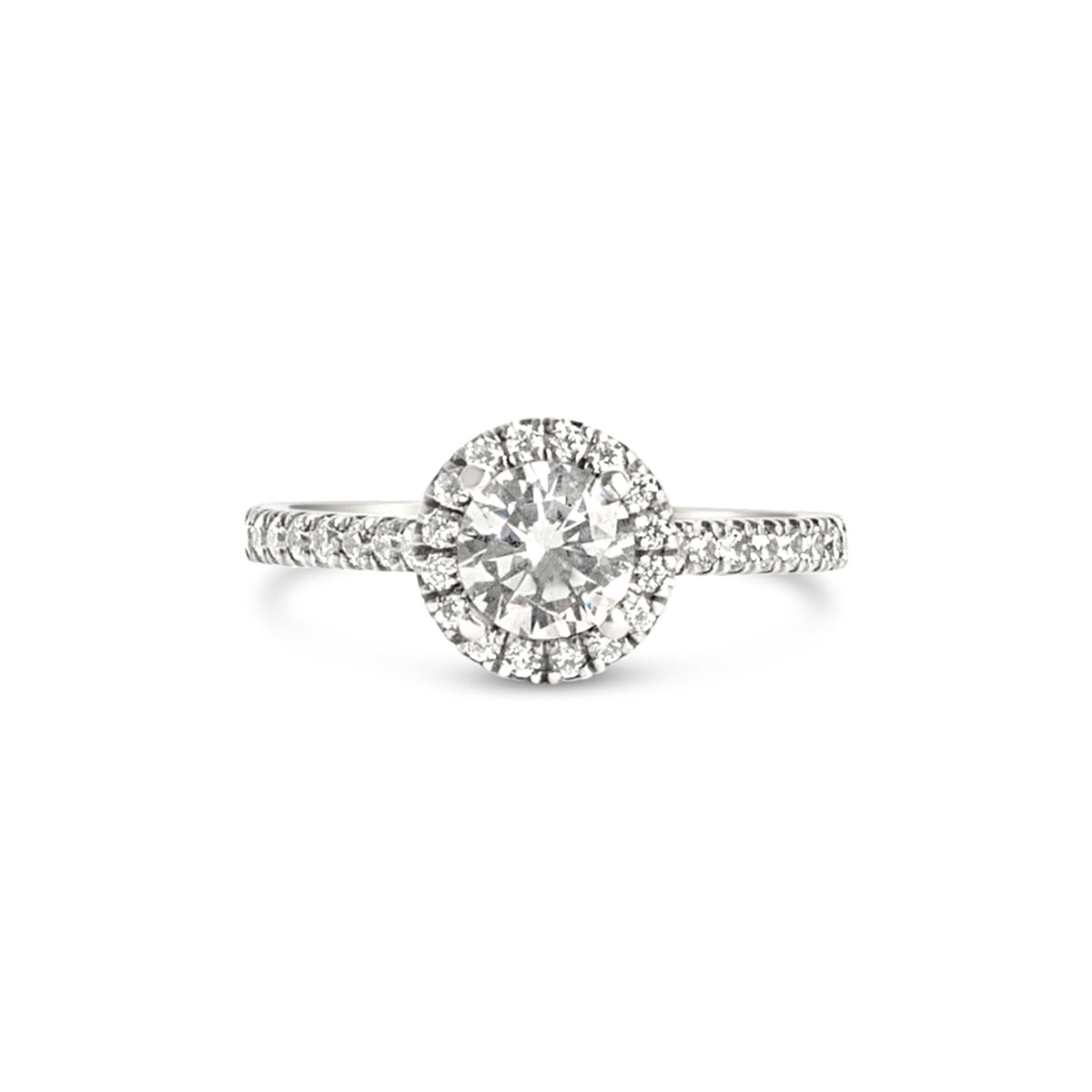 A halo engagement ring featuring a hand-picked center diamond with a halo of small diamonds surrounding the main stone.