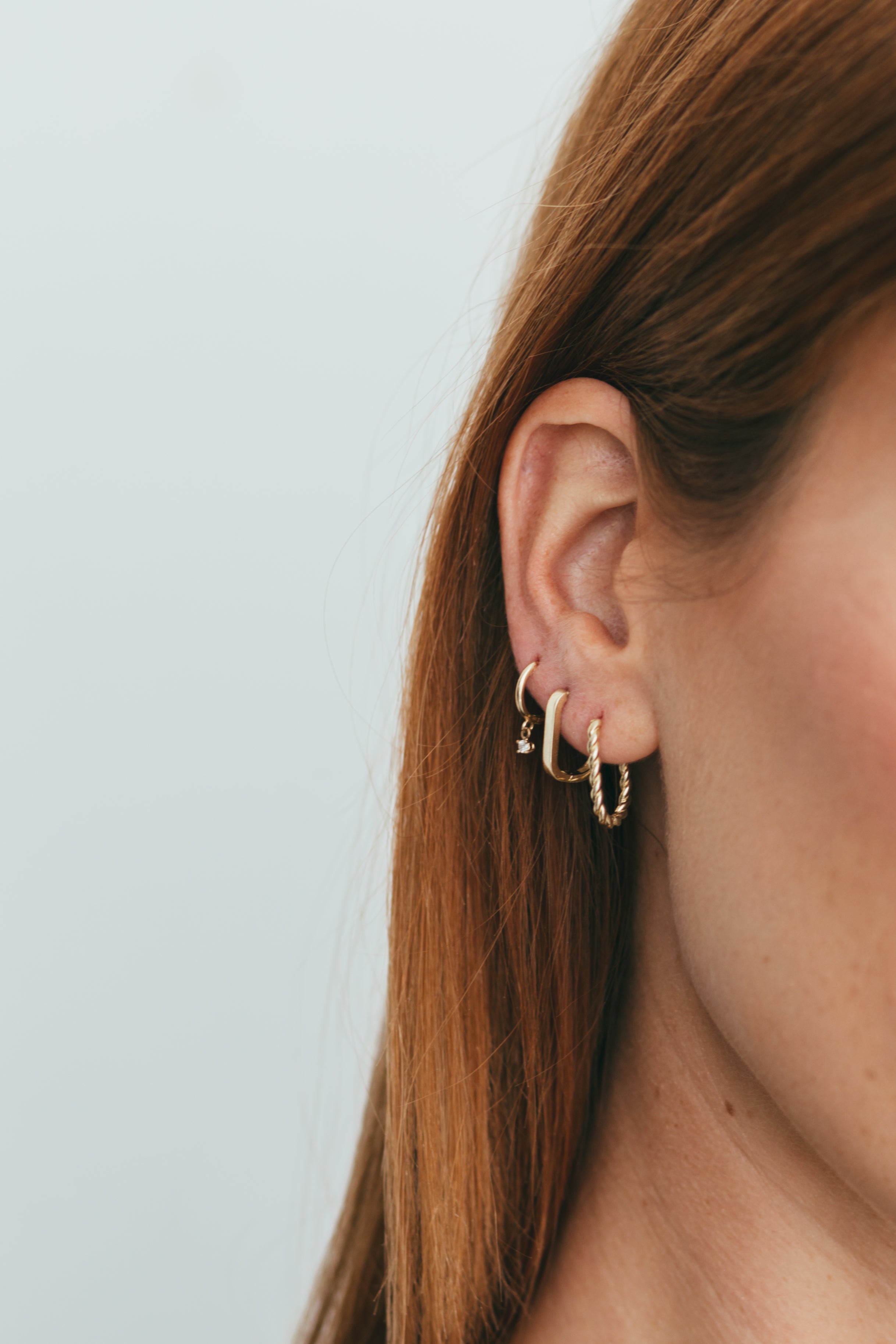 14K Gold Dangling Diamond Huggie Earrings