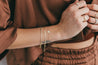 Jessica Jewellery's Flat Mirror Chain Bracelet styled casually.