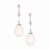 Pearl drop and diamond earrings by Jessica Jewellery. 