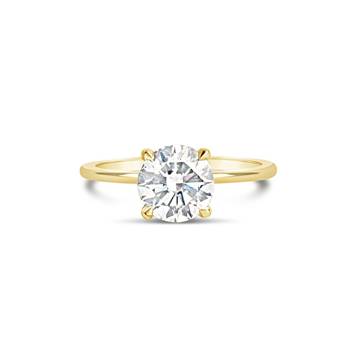 A solitaire engagement ring featuring a yellow gold band and a striking centre diamond.