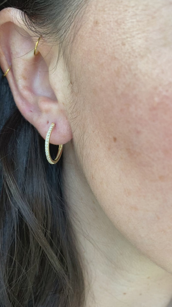 Stylish ensemble of gold diamond hoops alongside sleek, simple gold hoops, perfect for mixing and matching.