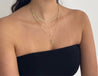 Close-up of Jessica Jewellery's Single Diamond Initial Necklace on a model - Elegant and Personalized Jewelry.